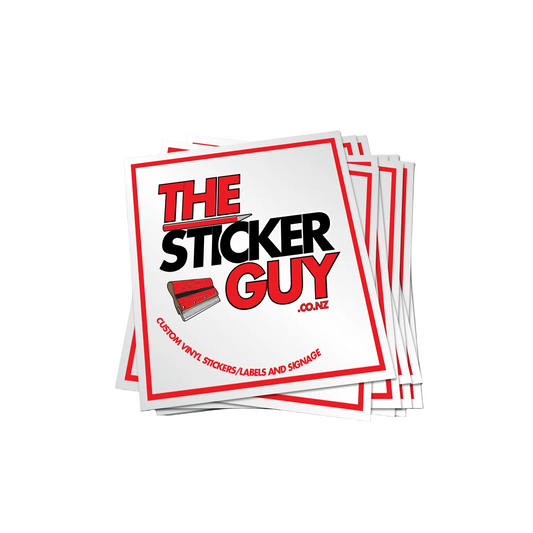 Stack of 'The Sticker Guy' branded stickers on a gray background