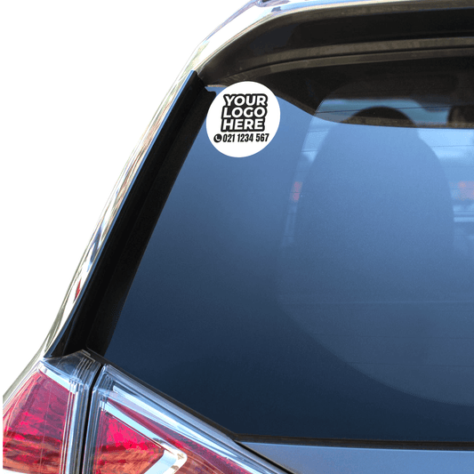 Car window with a customizable logo sticker on a clear background