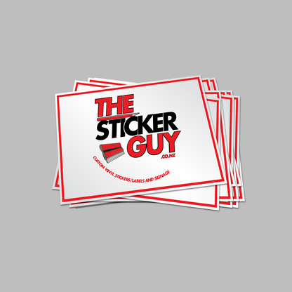 Stack of 'The Sticker Guy' branded stickers on a gray background